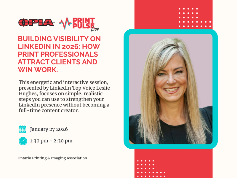Three professionals of diverse backgrounds engaged in a meeting, discussing documents and digital content at a conference table in a bright office setting.