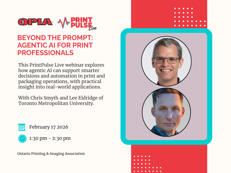 Three professionals of diverse backgrounds engaged in a meeting, discussing documents and digital content at a conference table in a bright office setting.
